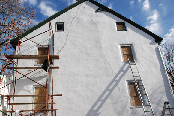 plaster painted west side - trim under way